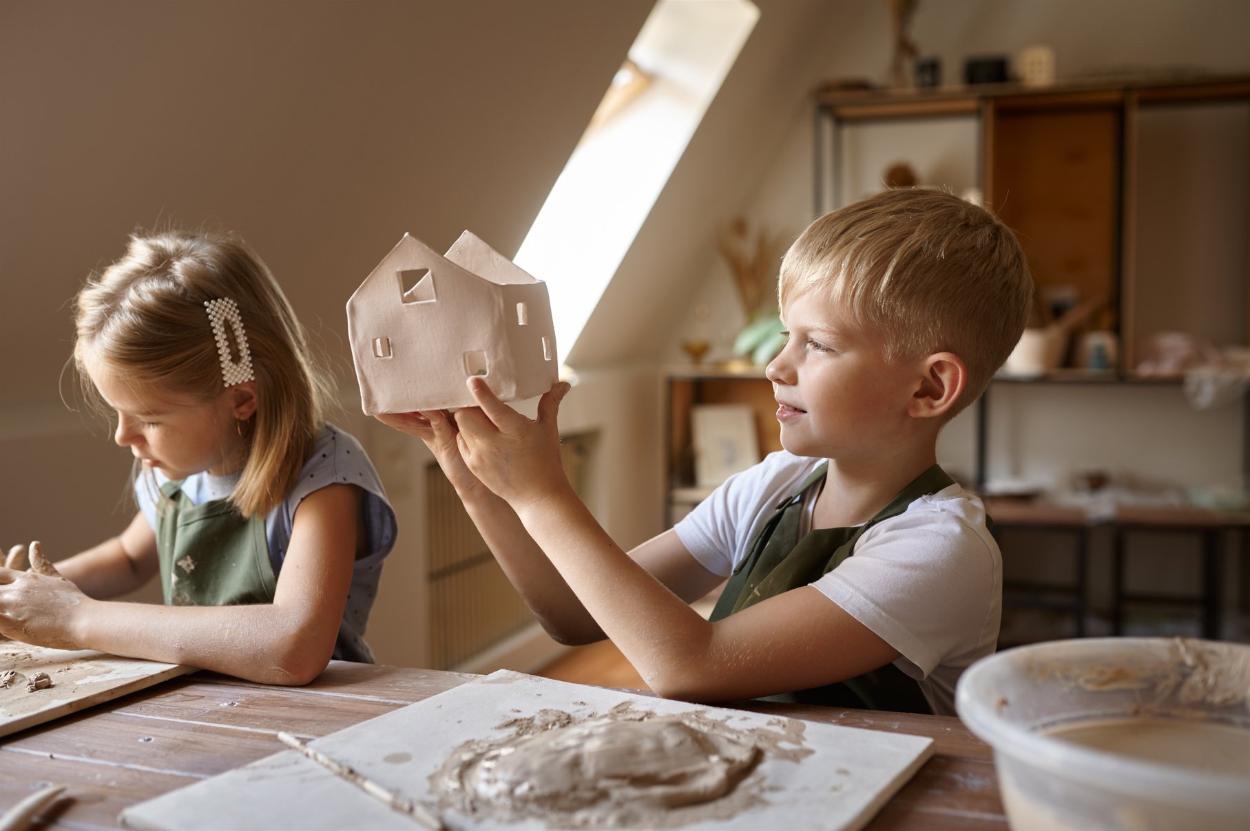 Children Making Products from Clay in Workshop